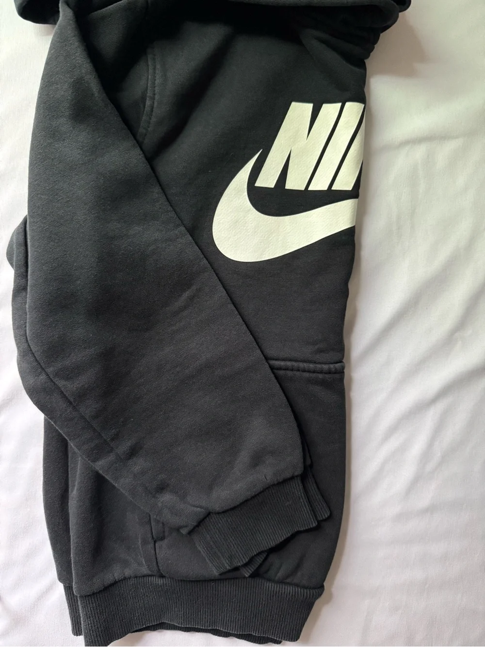 Nike Kids Black Hoodie with White Swoosh Logo